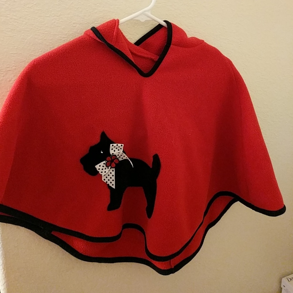 Red fleece pancho with black Scottish terrier