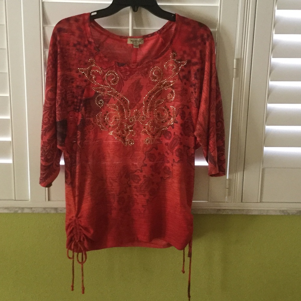 Coral print blouse.
