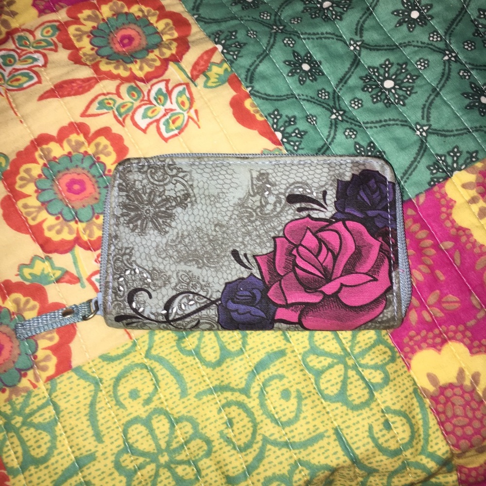 Light blue with rose detailing wallet.