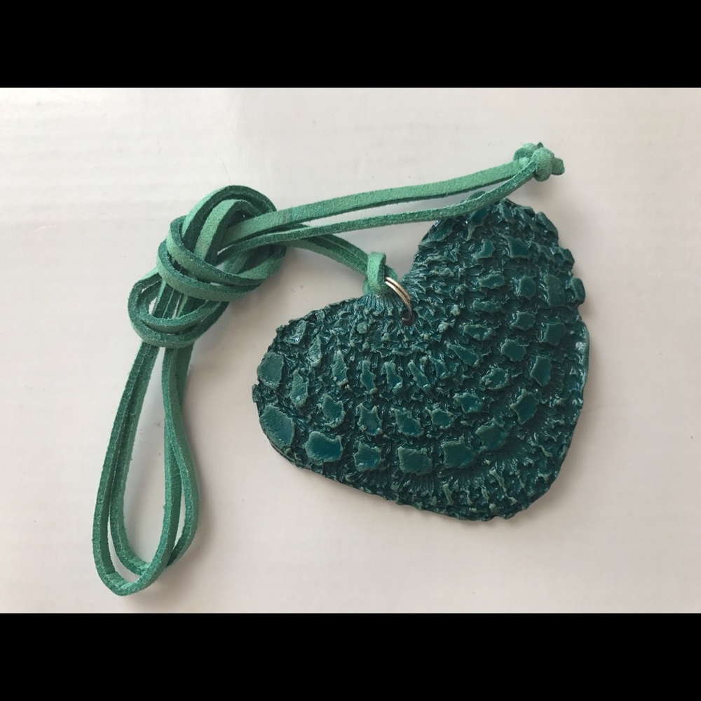 Handmade ceramic necklace.