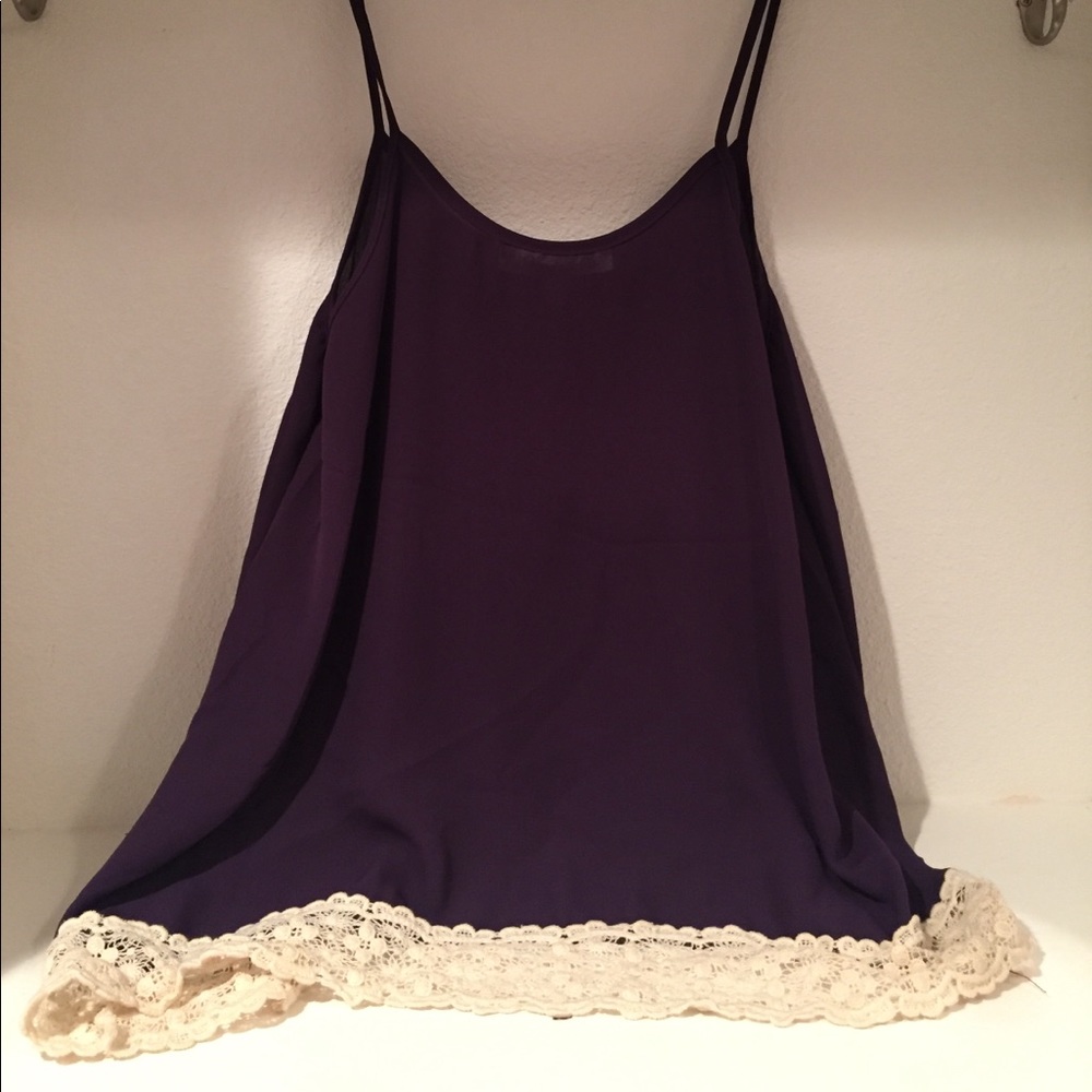 Dark purple blouse with crochet trimming