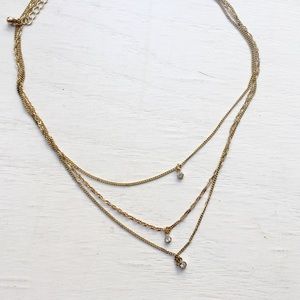 Gold tone layered choker