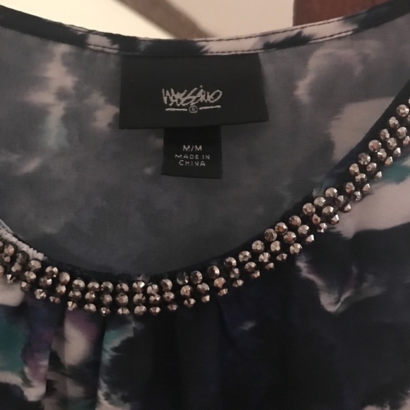 Sleeveless shirt - Picture 2 of 2