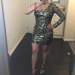 Black and gold sequence dress