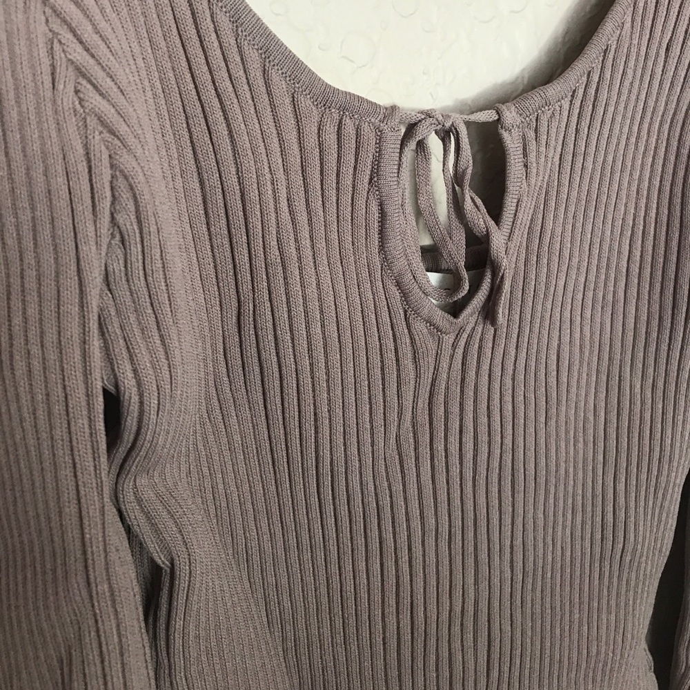 nude colored body suit