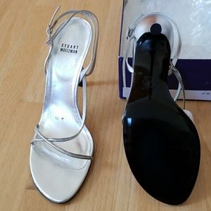 Beautiful Stuart Weitzman silver strappy sandals.
