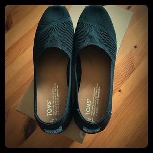 Toms classic black custom knit slip on.