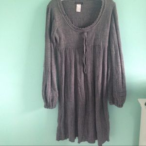A gray long sleeved dress