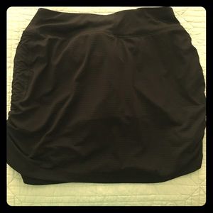 Black polyester and spandex skort