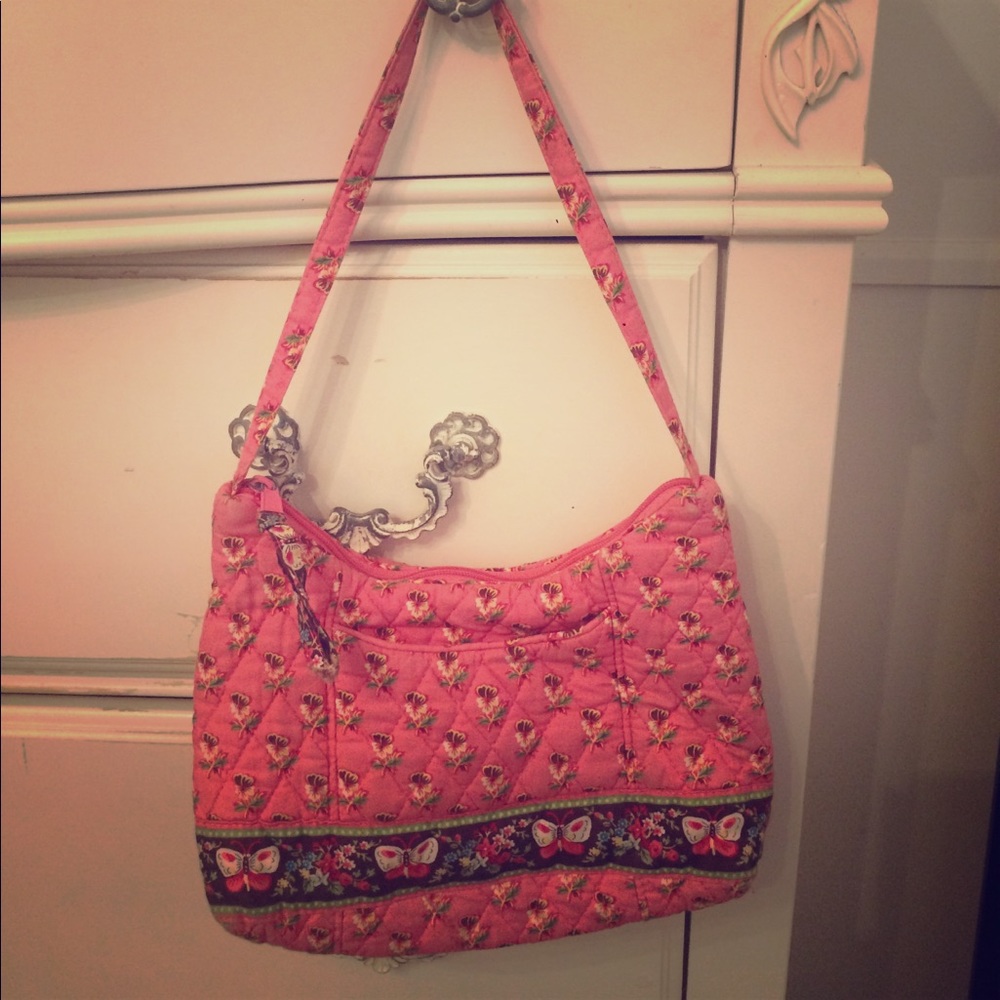 This is a tiny authentic Vera Bradley bag
