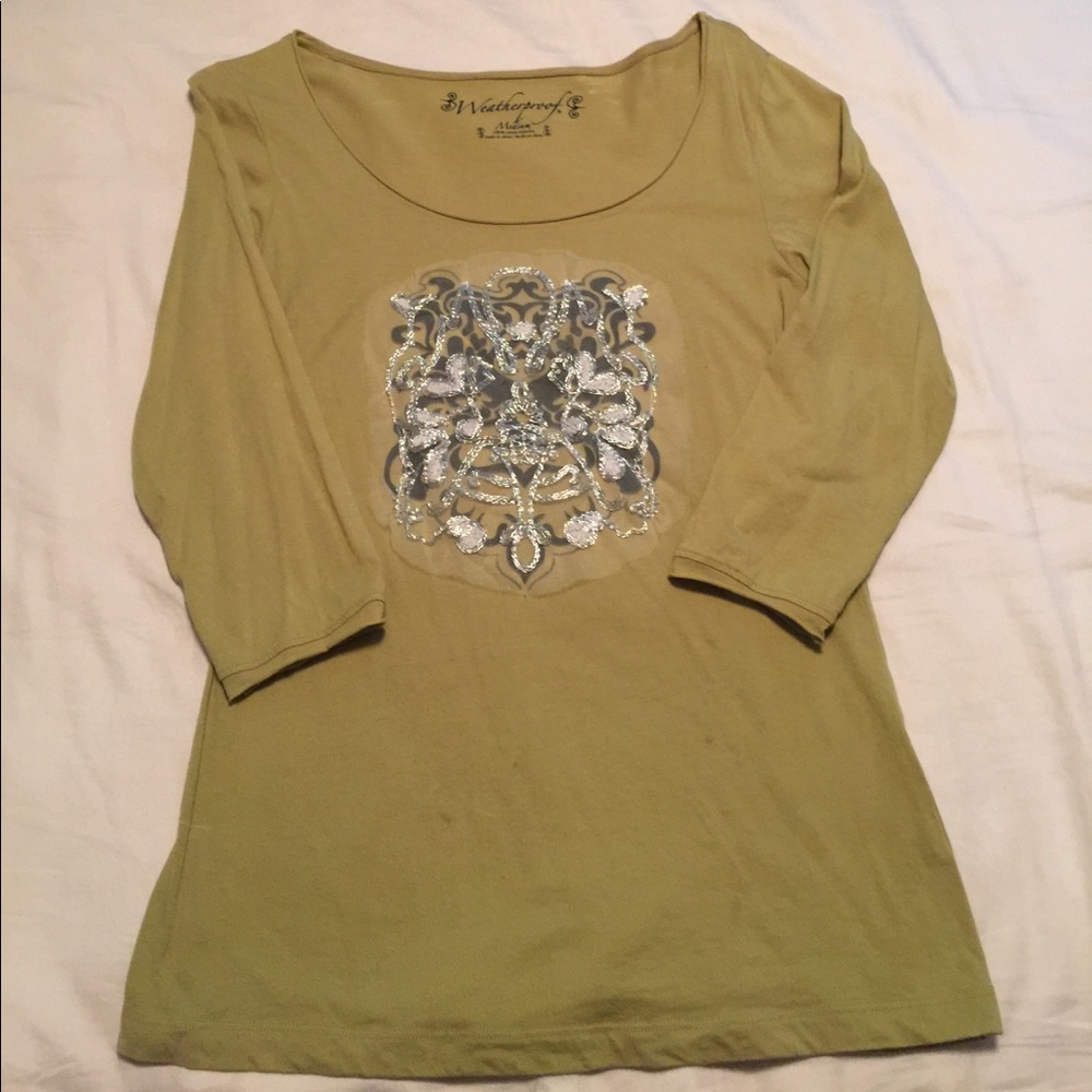 Green top with embellishments