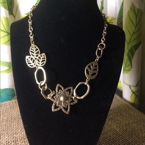 Golden leaf and flower necklace