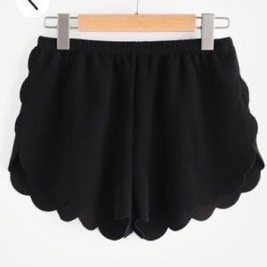 ruffled black shortie shorts