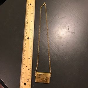 Gold envelope with note necklace