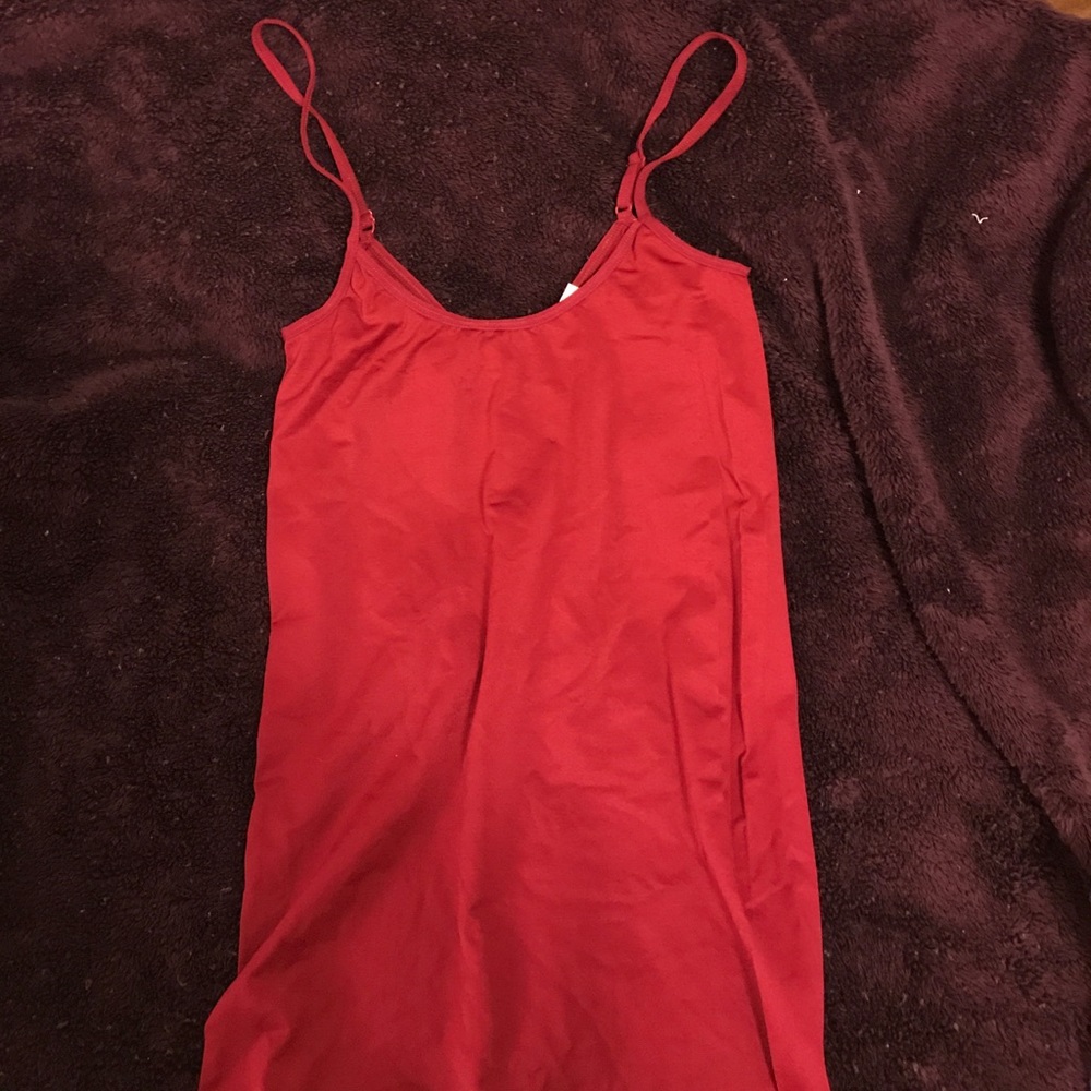 Unknown brand. Scoop and v neck spandex tank