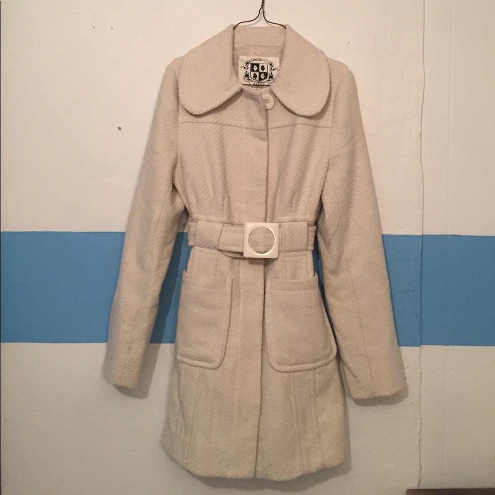 Cream colored button up jacket with belt