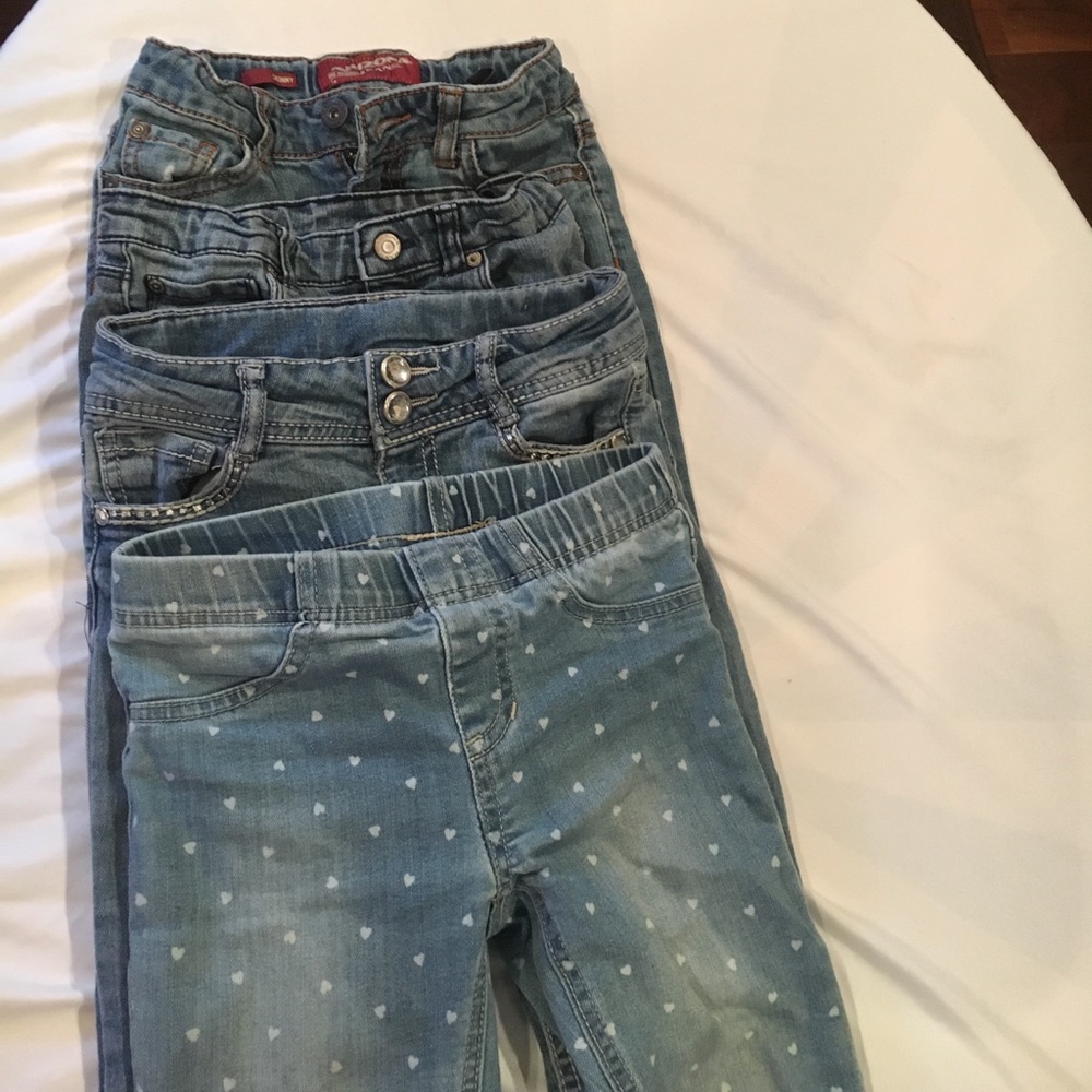 Four pairs of cute stylish Jeans.