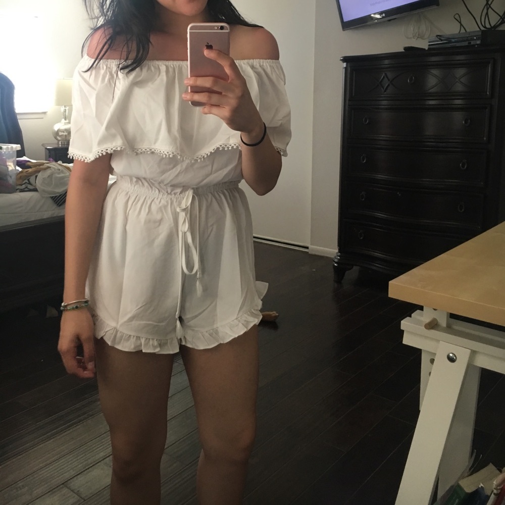 Sold! White one piece romper!