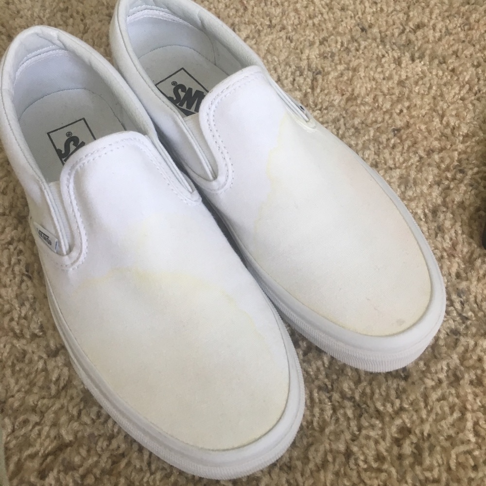 Vans white slip ons