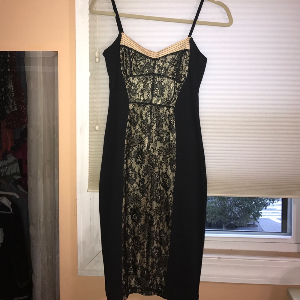 Lace fitted midi dress.