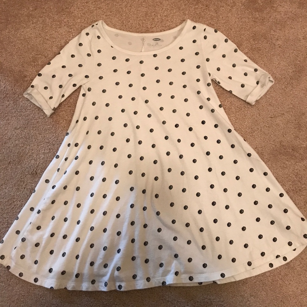 Polka dotted flared tshirt.