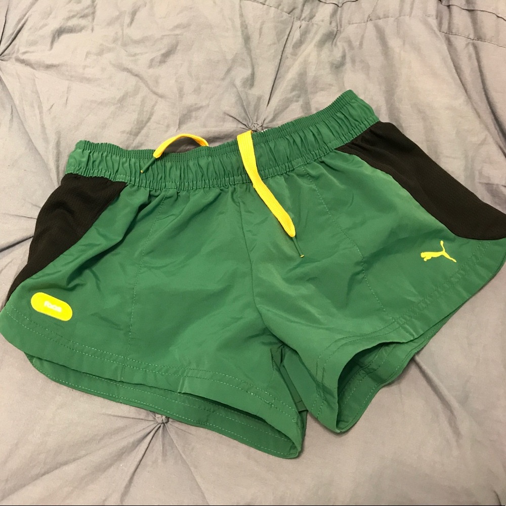 Green, black and yellow Puma running shorts