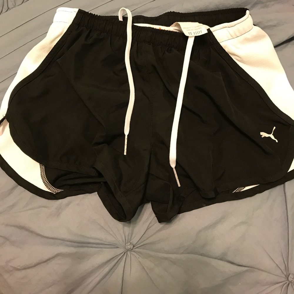 Black and white Puma running shorts
