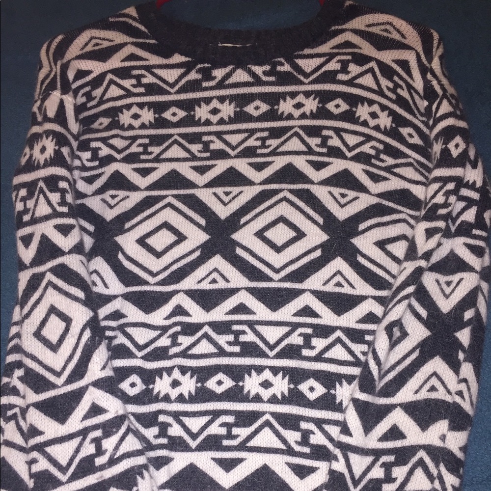 Light sweater, good material, fun pattern.
