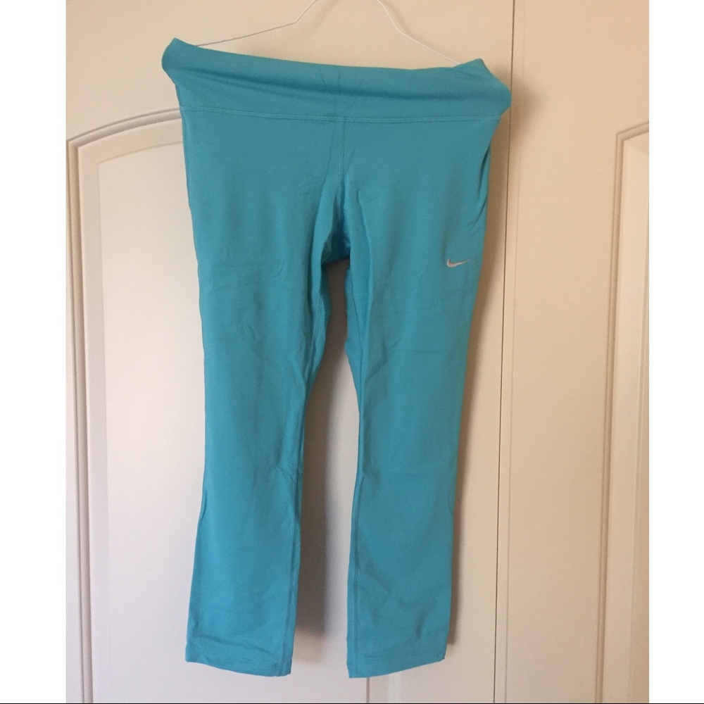 Bright blue turquoise Nike dri-fit legging tights