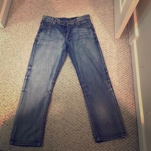 new condition pair of designer jeans