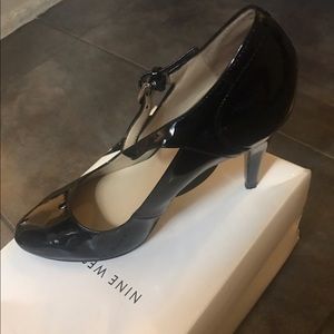 Round toe black heels with strap-comes with box