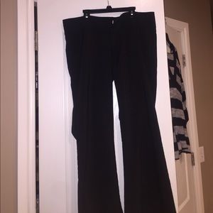 Women's black straight/wide legged dress pants.