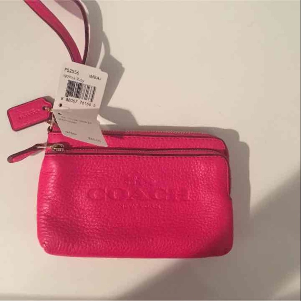 Coach hot pink wristlet