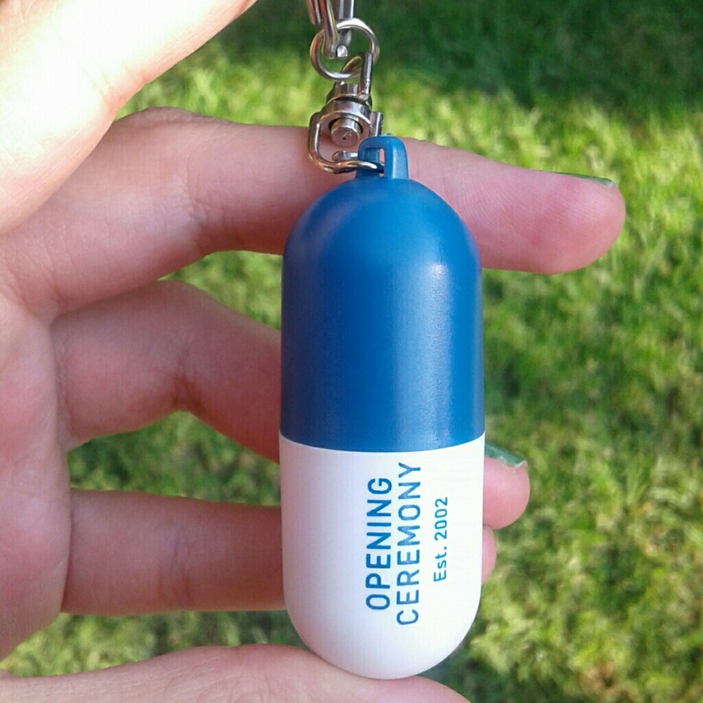 OPENING CEREMONY PILL HOLDER KEYCHAIN CHARM