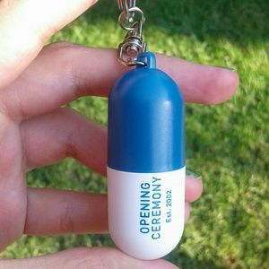 OPENING CEREMONY PILL HOLDER KEYCHAIN CHARM