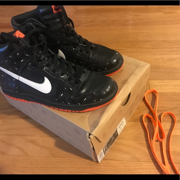 black and orange nike high tops