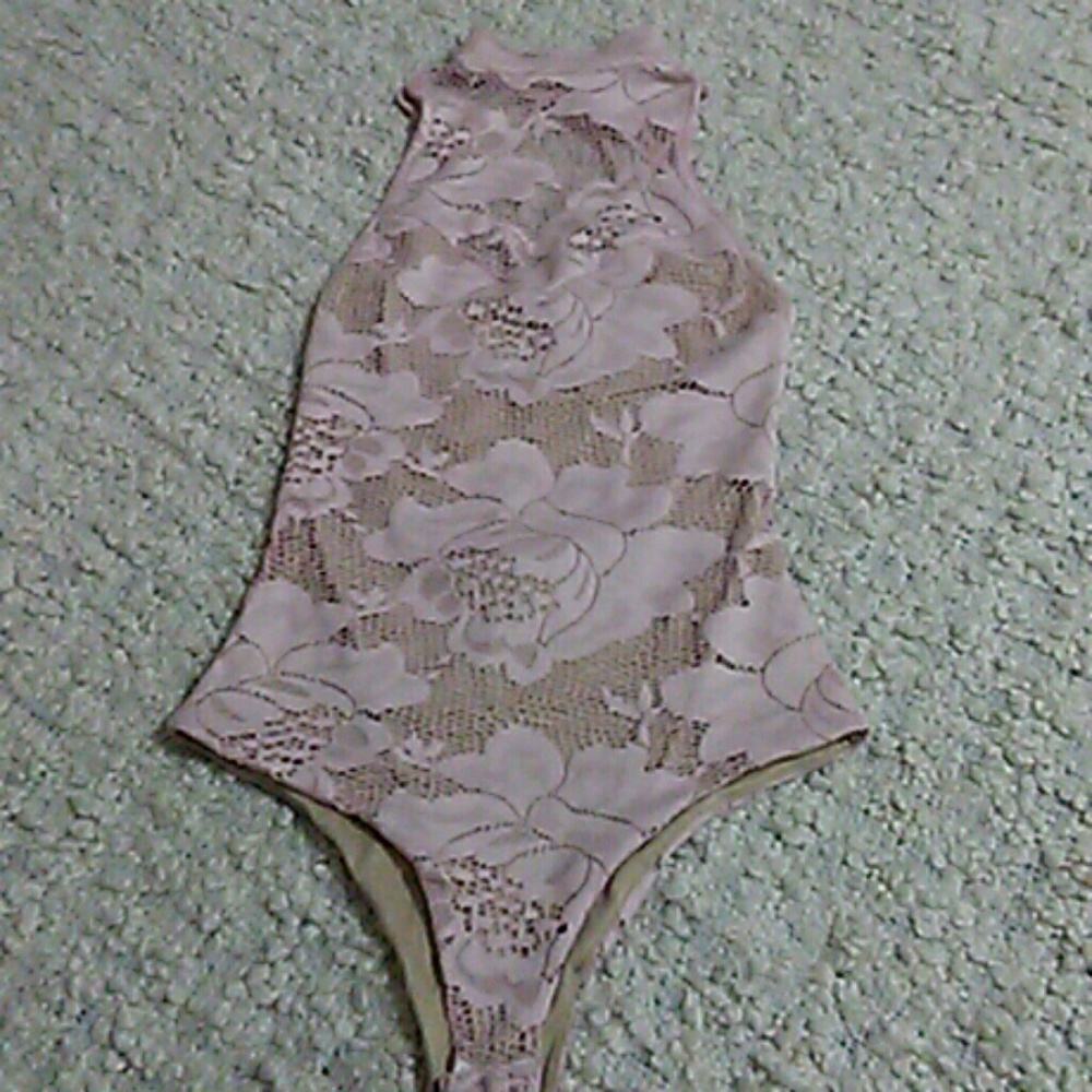 Muted pink floral lace bodysuit.