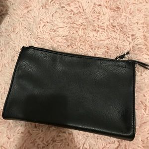 Double zipper clutch