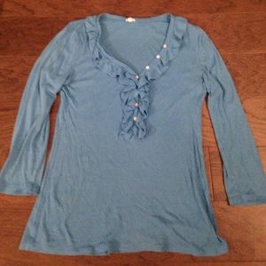 Super cute on blouse with a few ruffles