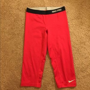 Red/coral Nike workout leggings