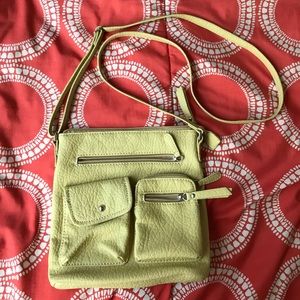 Soft yellow sling purse