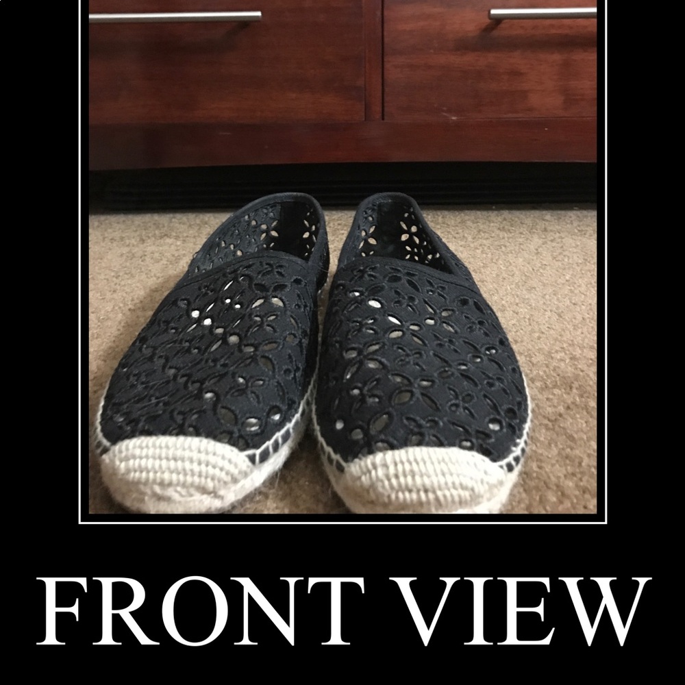 Size 10 black floral cut out pattern of MK flats