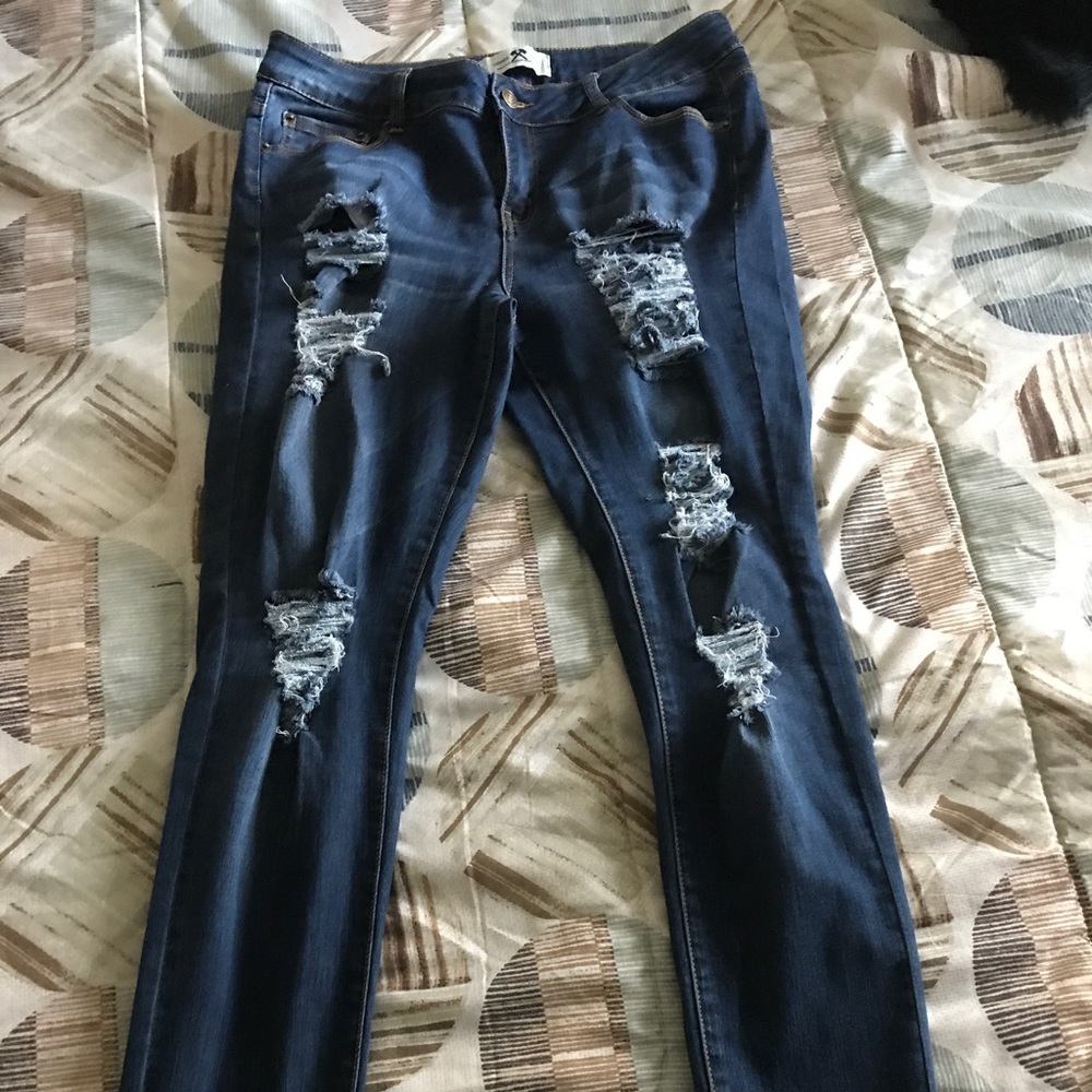 Ripped stretch jeans $5