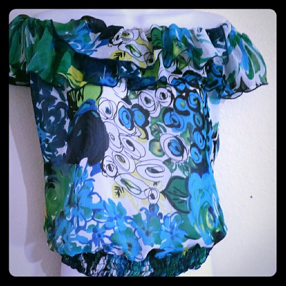 Lovely off the shoulder smocked ruffle top