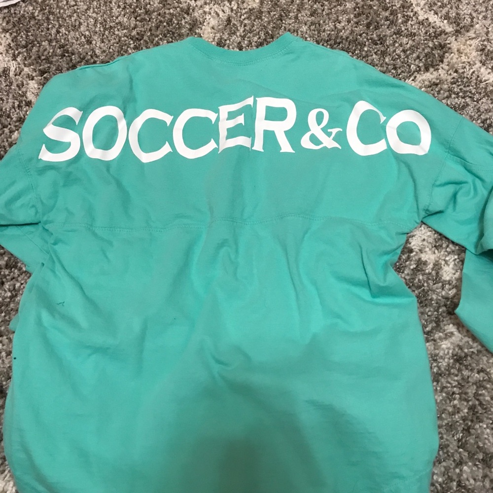 Soccer &Co varsity tee