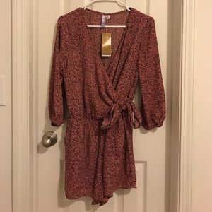 Francesca's Floral Romper New with tags