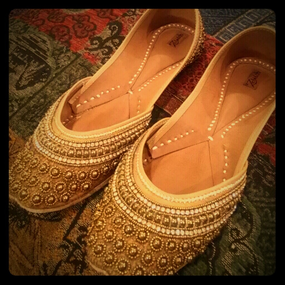 Shiny golden beaded genie flats from Zebidah