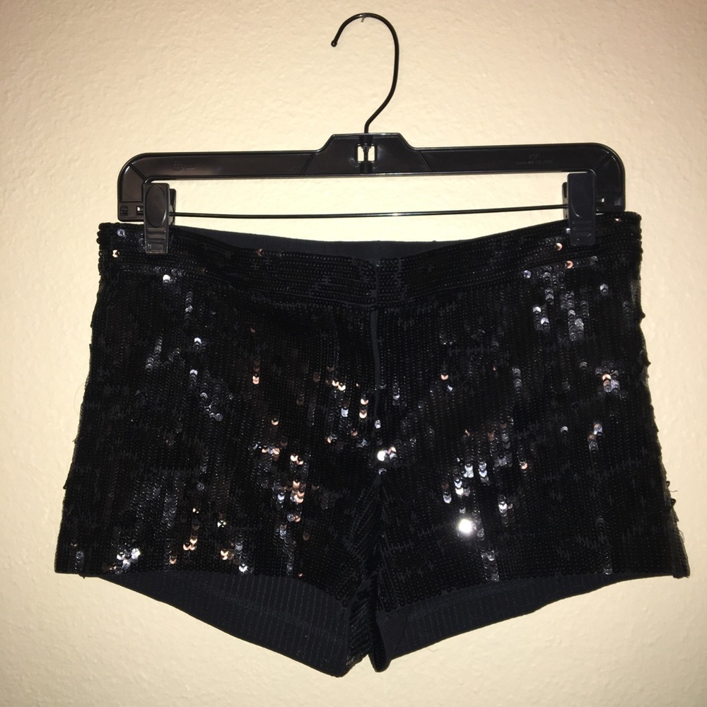Express sequin shorts in black.