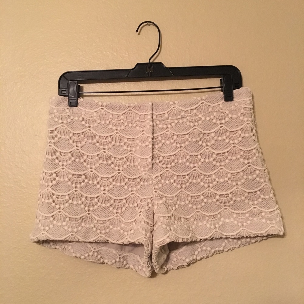Express crocheted, lace shorts in khaki/tan.