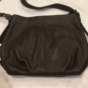 Brown, leather COACH purse.